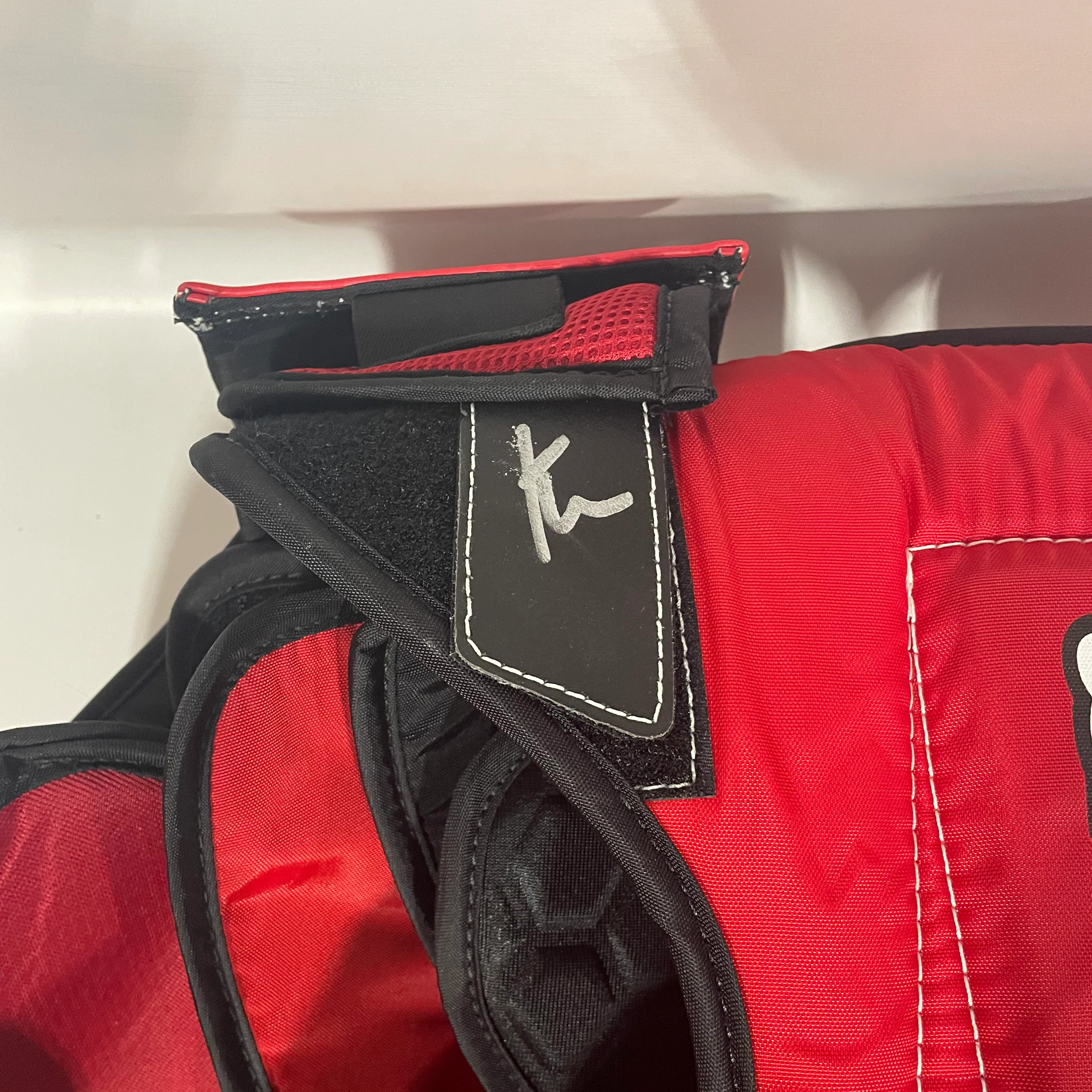 Brians Optik 2 - NHL Pro Stock Goalie Chest Protector - Calgary Flames (Red/Black/Yellow) - Image 3