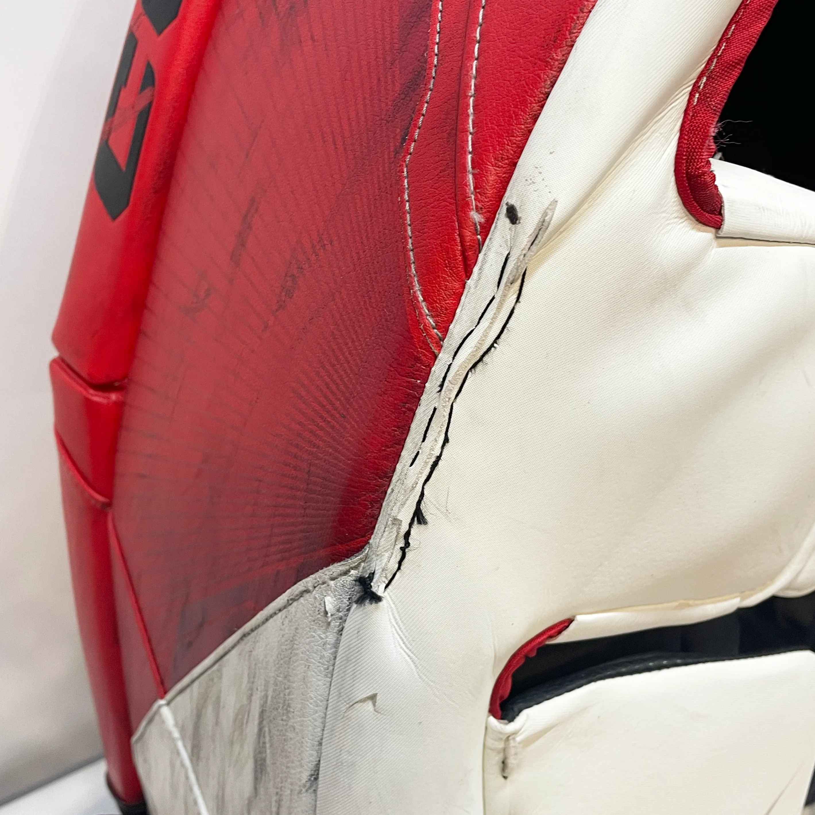 CCM AXIS 2 - Used Pro Stock Goalie Pads (White/Red/Black) - Image 2