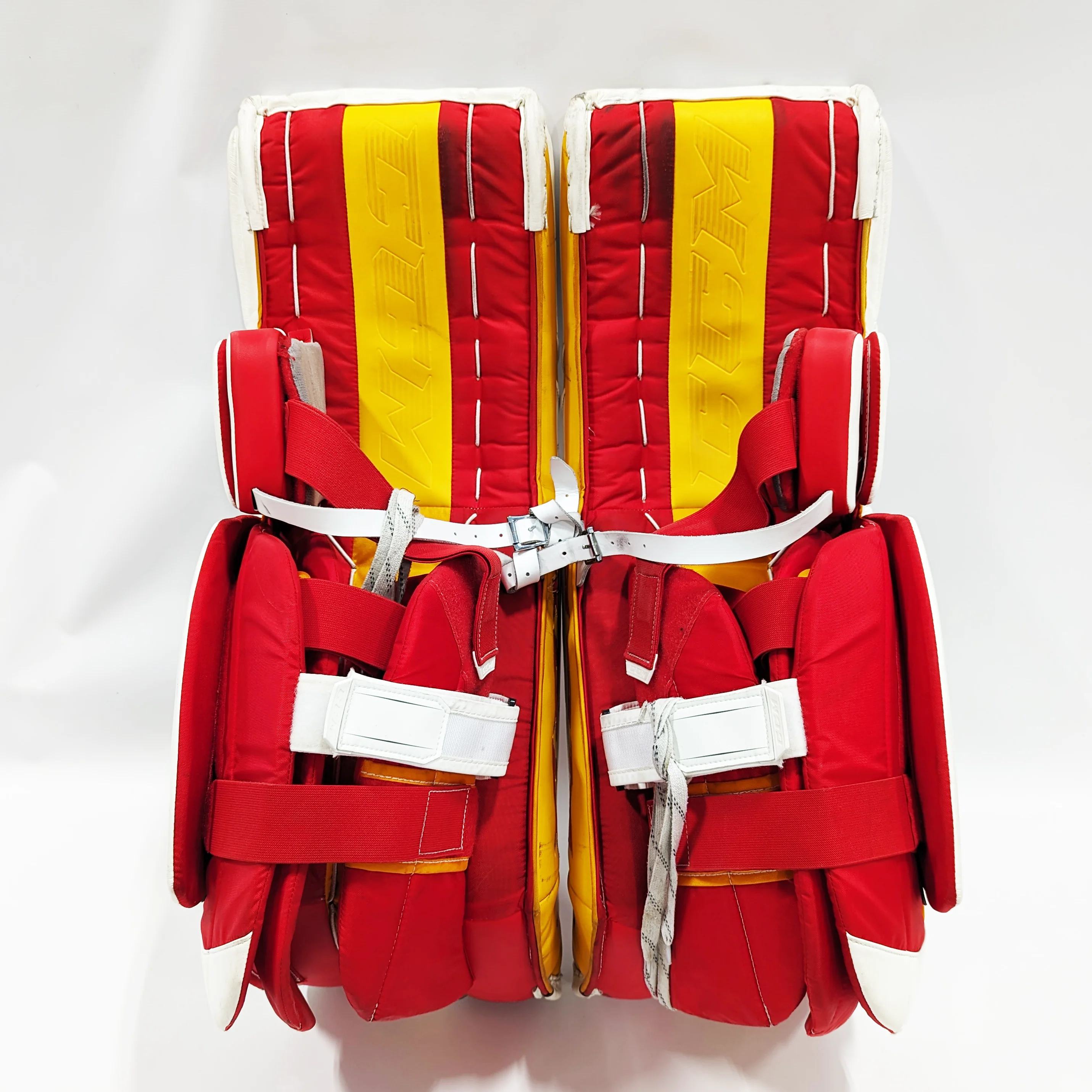 CCM Extreme Flex 5 - Used AHL Pro Stock Goalie Pads (White/Red/Yellow) - Image 4