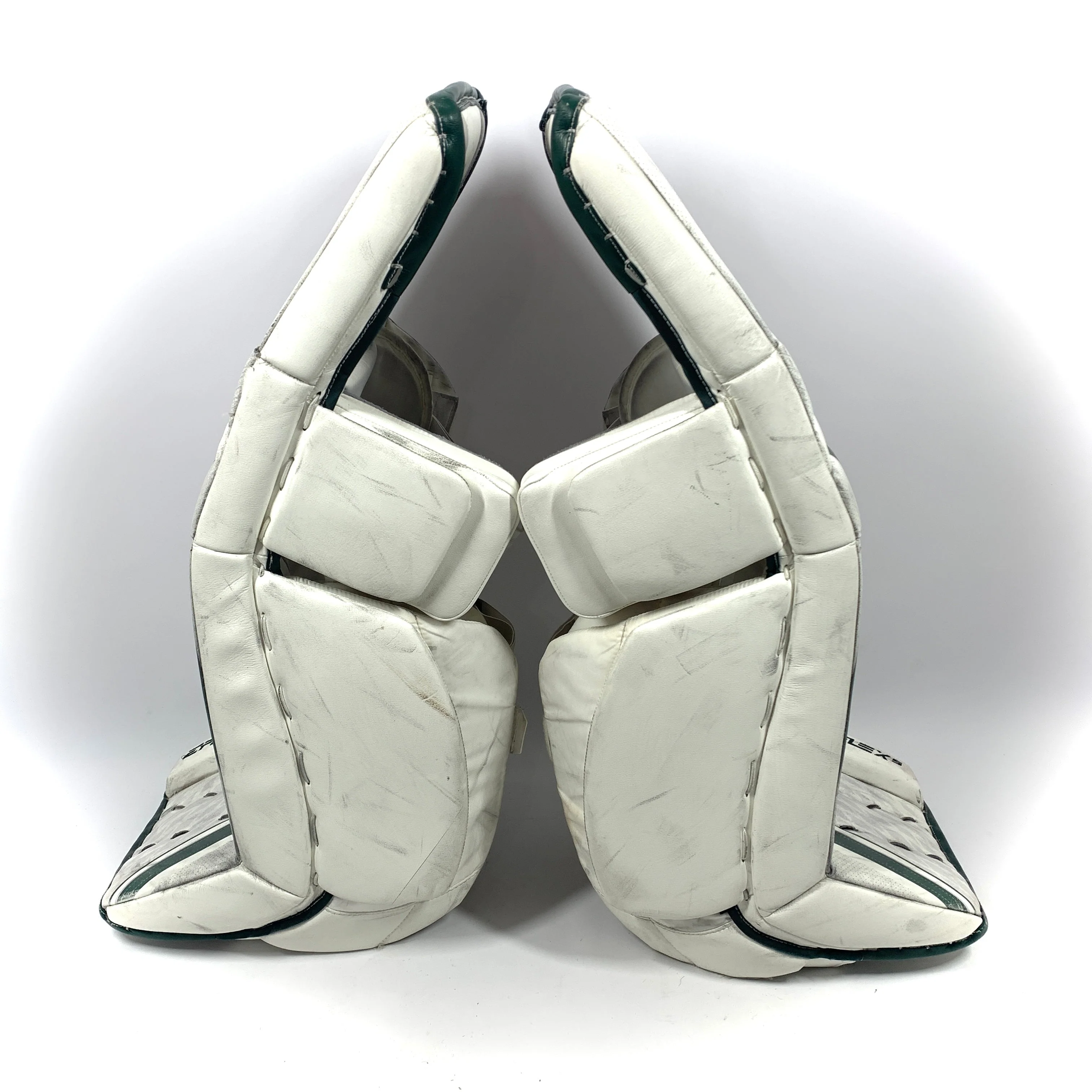 CCM Extreme Flex 5 - Used Pro Stock Goalie Pads (White/Green) - Image 2
