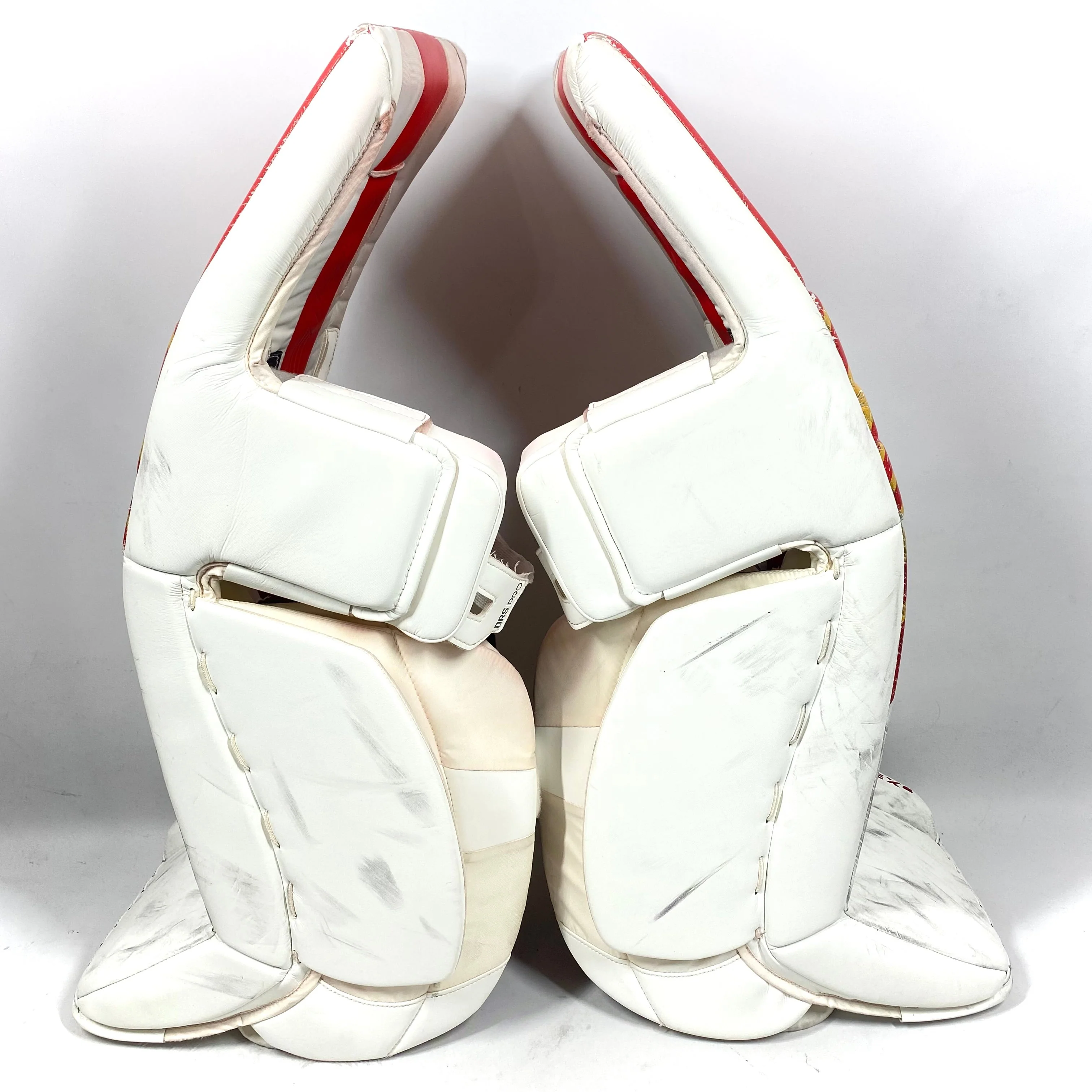 CCM Extreme Flex 6 - Used Pro Stock Goalie Pads (White/Red/Yellow) - Image 2
