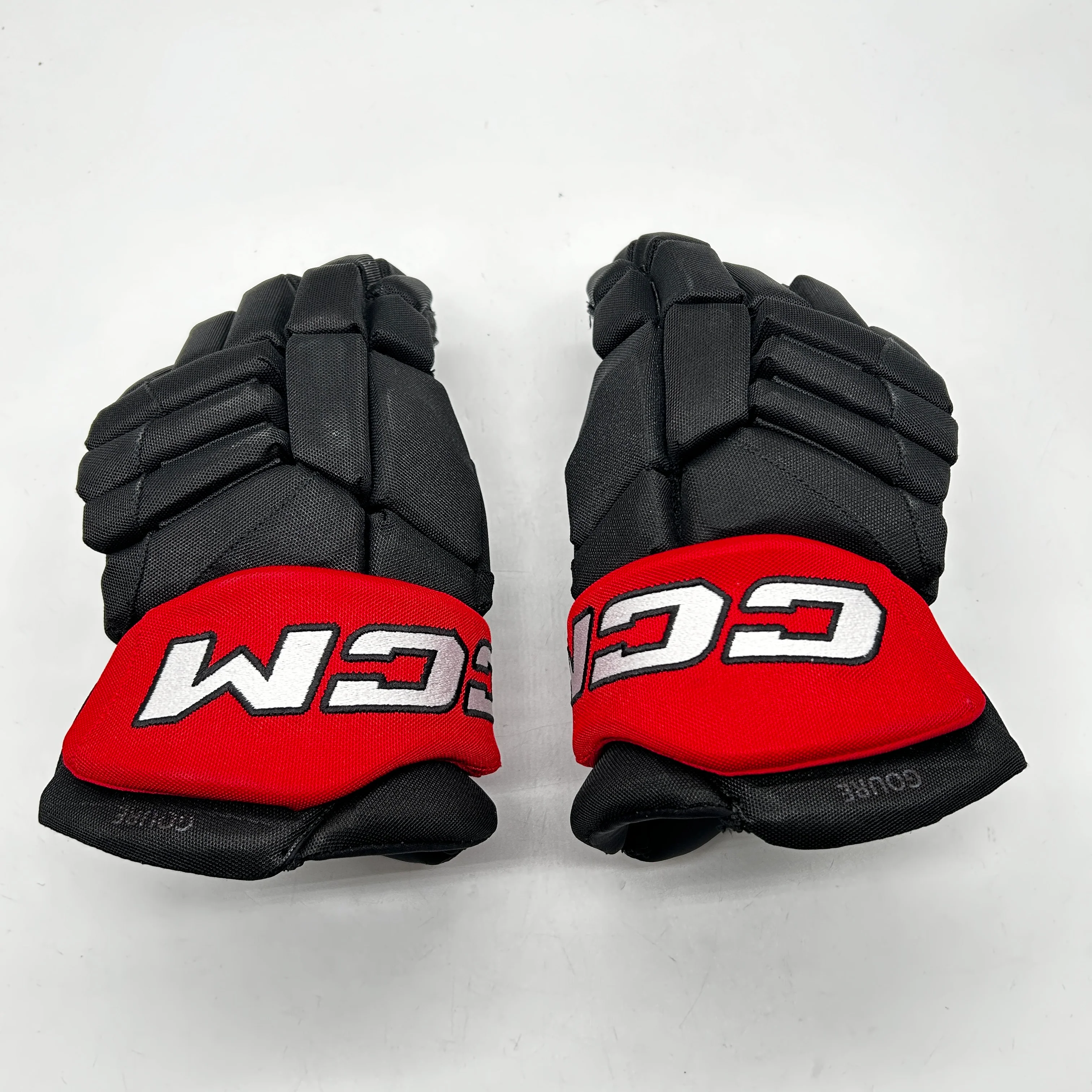 CCM HGJSCHL - Used Pro Stock Hockey Gloves (Black/Red)